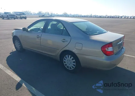 2003 Toyota Camry Xle z USA, uszkodzony, nr VIN 4T1BE32KX3U248713